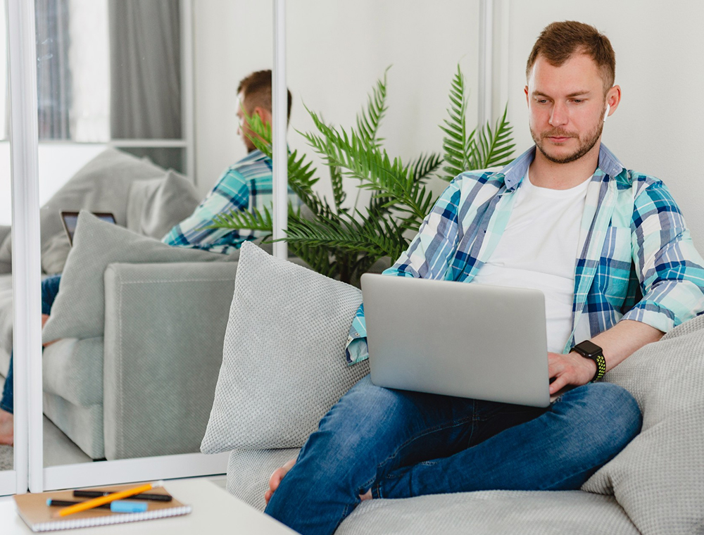 A person using a laptop to search for home improvement services online